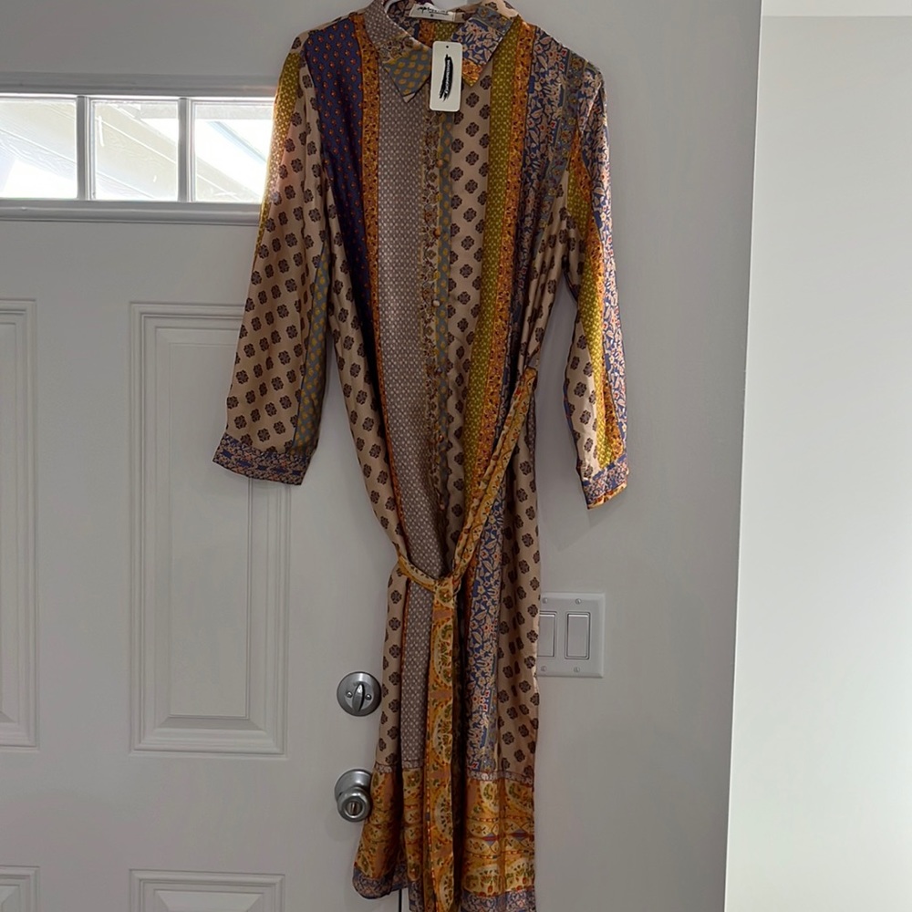 Women’s dress with buttons/tie